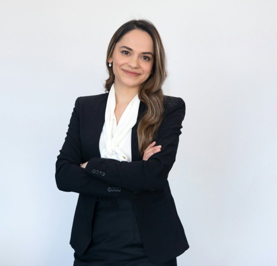 a-woman-in-a-black-suit.jpg a woman in a black suit